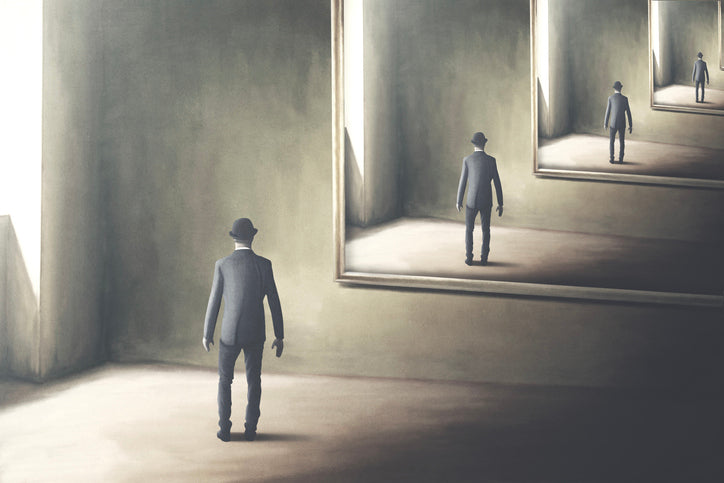 Surreal digital art of a man in a suit facing an infinite series of mirrors